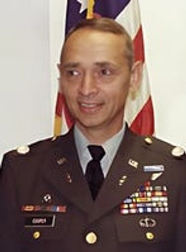 COL (Ret.) Larry E. Cooper